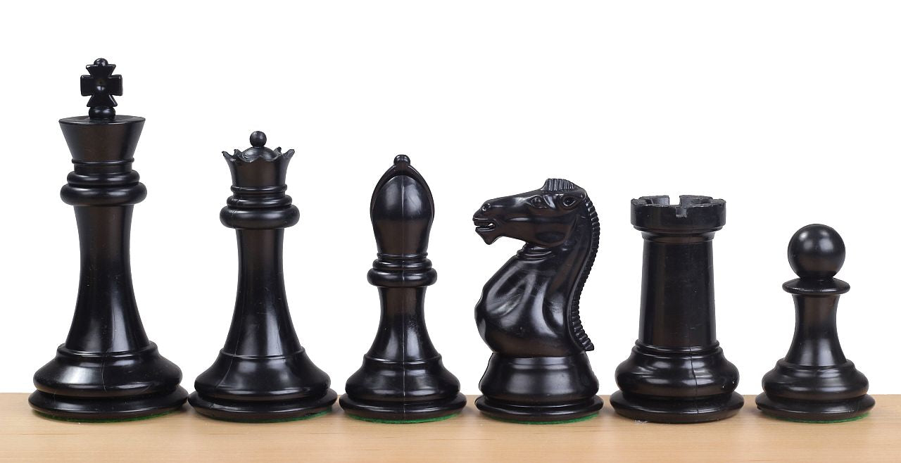 Piezas de ajedrez de plástico de 4" con peso de rey y reinas adicionales en blanco y negro